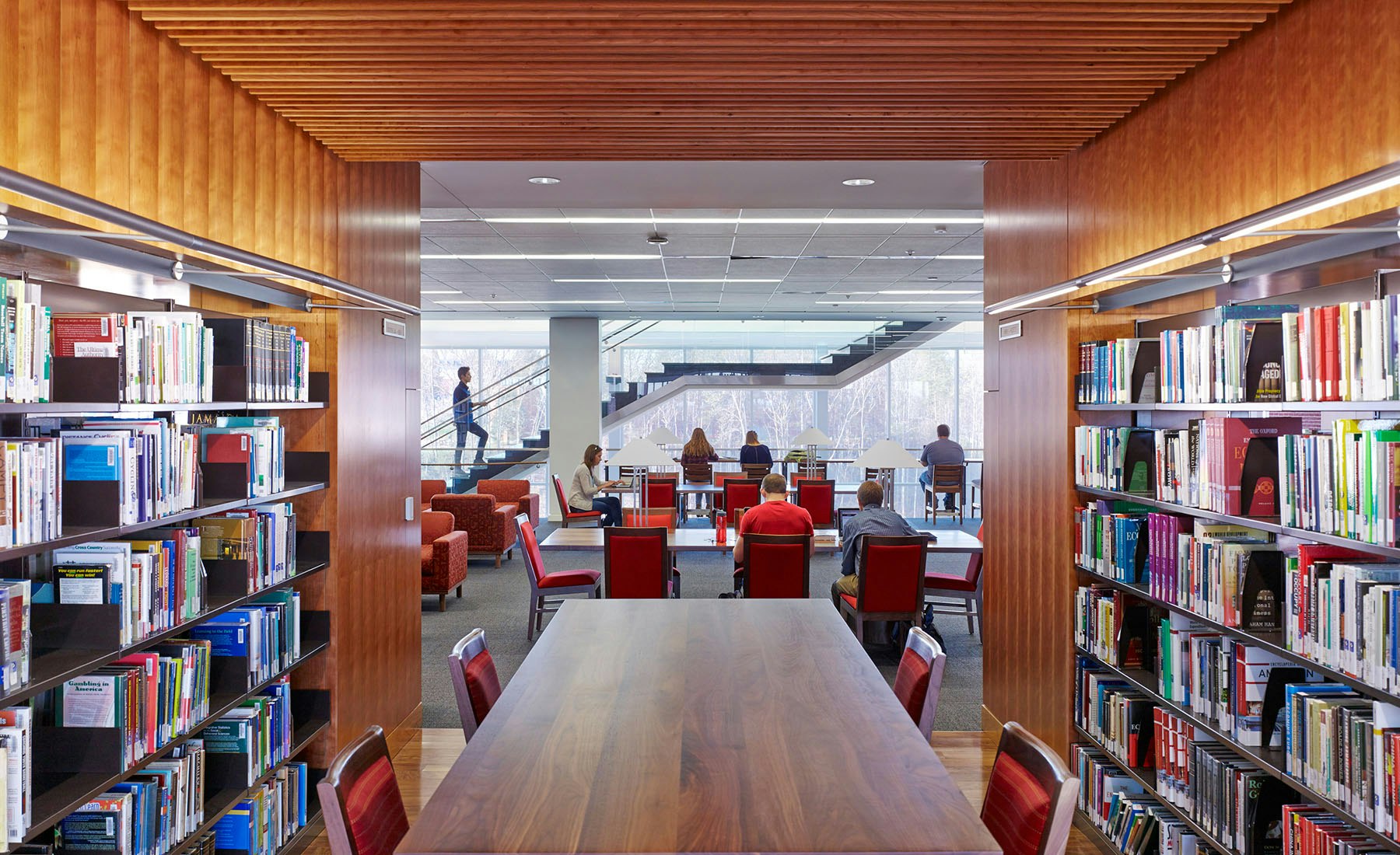 Compared to prototypical libraries of the past, Liberty’s new flagship library reverses the notion of book storage as the central motive of a library’s design in favor of a user-centric layout that places student activity in the foreground.